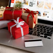 Gifts and credit card on the laptop.