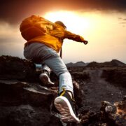 Man climbing mountain.