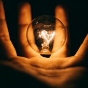 Lightbulb in the hand.
