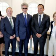 Group of people announcing jobs for ServiceNow in Dublin.