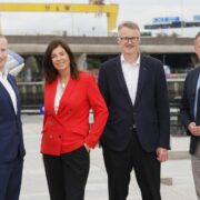 Three men and a woman in Belfast.