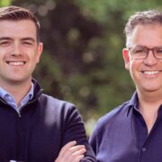 Two men in navy tops.
