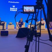 A panel of speakers at a business event in Ireland.