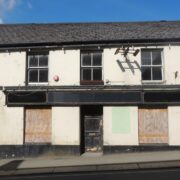 Decaying, closed Irish pub.