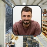 Man inset on image of a warehouse.