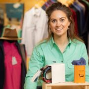 Woman in green blouse in a farm shop.