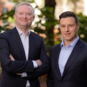 Two men in smart suits.