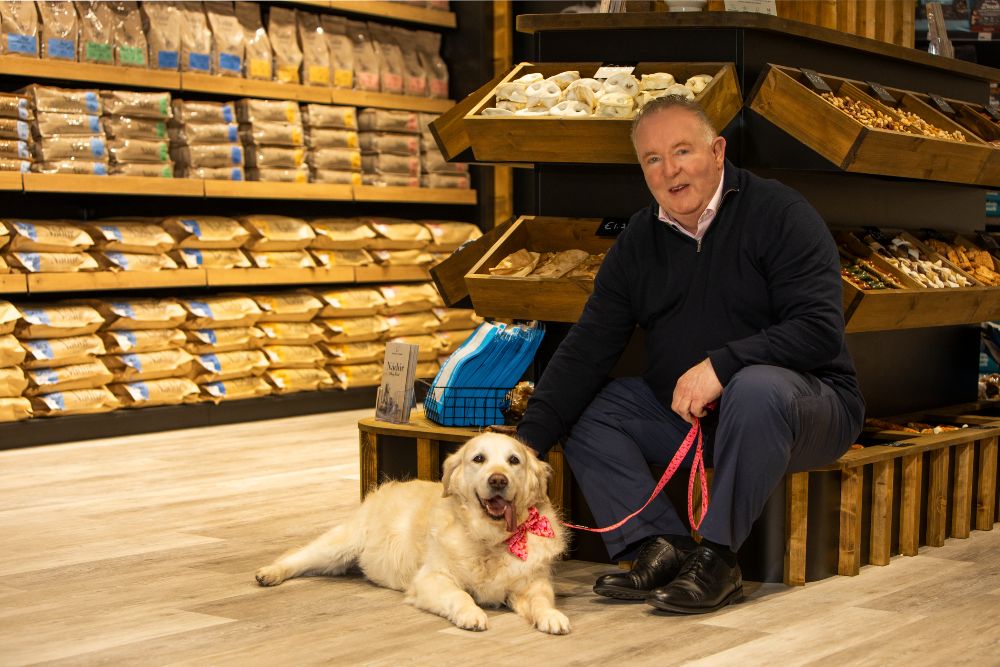 A man and his golden retriever.