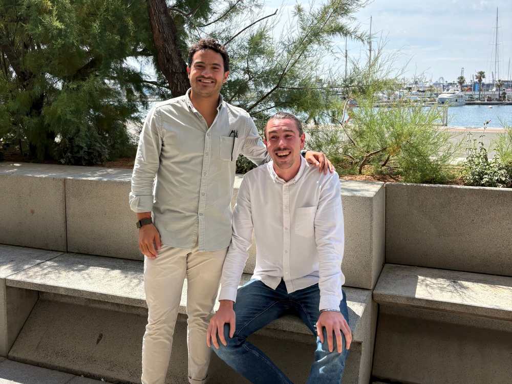 Two men beside the sea,