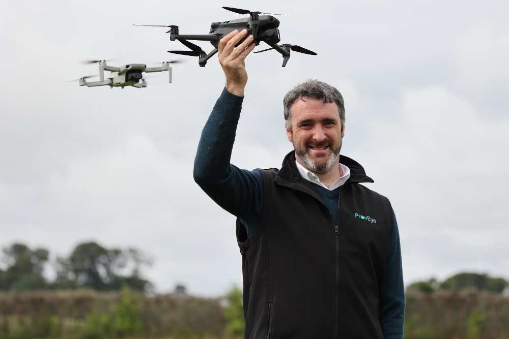 man holding a drone.