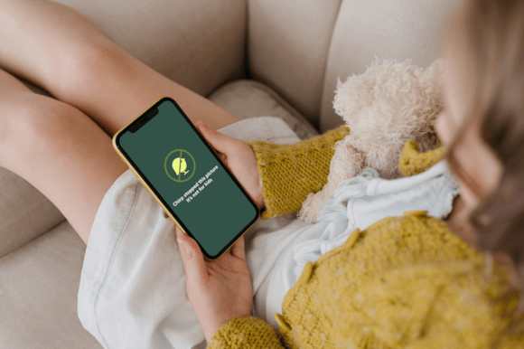 Kid holding a phone protected by Chirp technology.