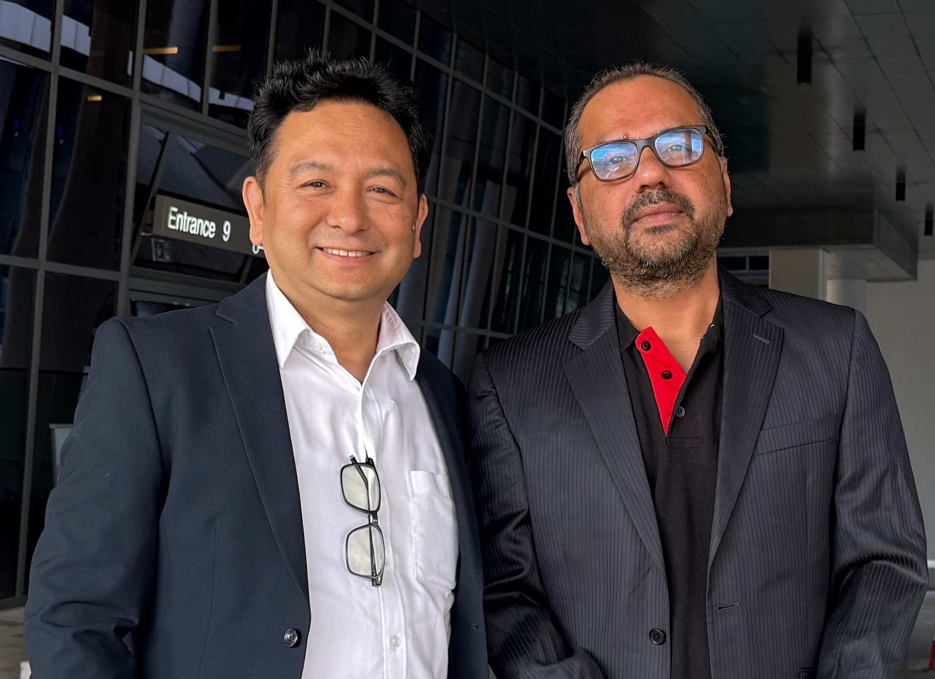 Two men in sports jackets.